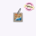 Médaille Timbre balade sur la plage